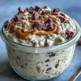 Healthy cookie dough overnight oats layered with chocolate chips and oats.